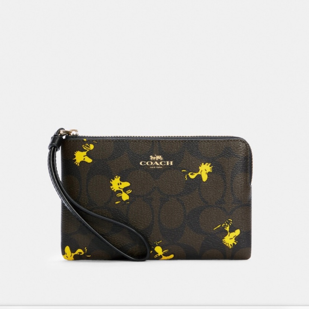 Coach X Peanuts Corner Zip Wristlet In Signature Canvas With Woodstock Print